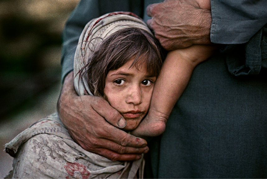 A refugee girl and her father near Feyzabad.