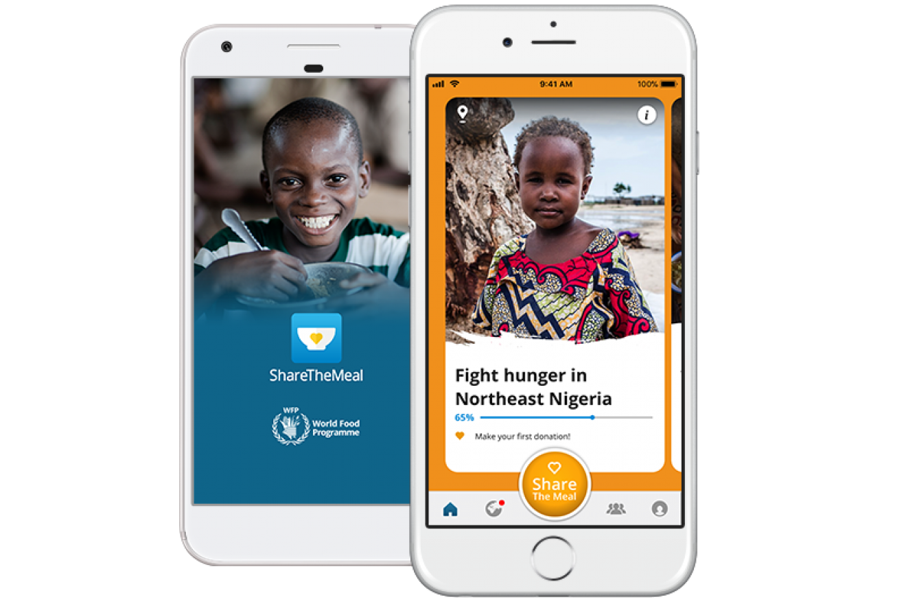 cell phones with ShareTheMeal on screen