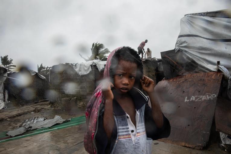 child after storm in Mozambique