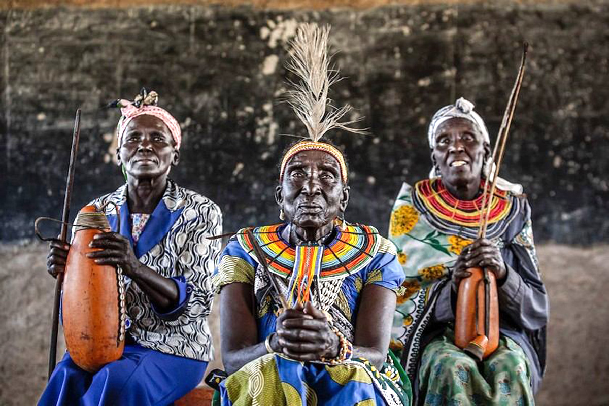 Portrait of three women in traditional dress.