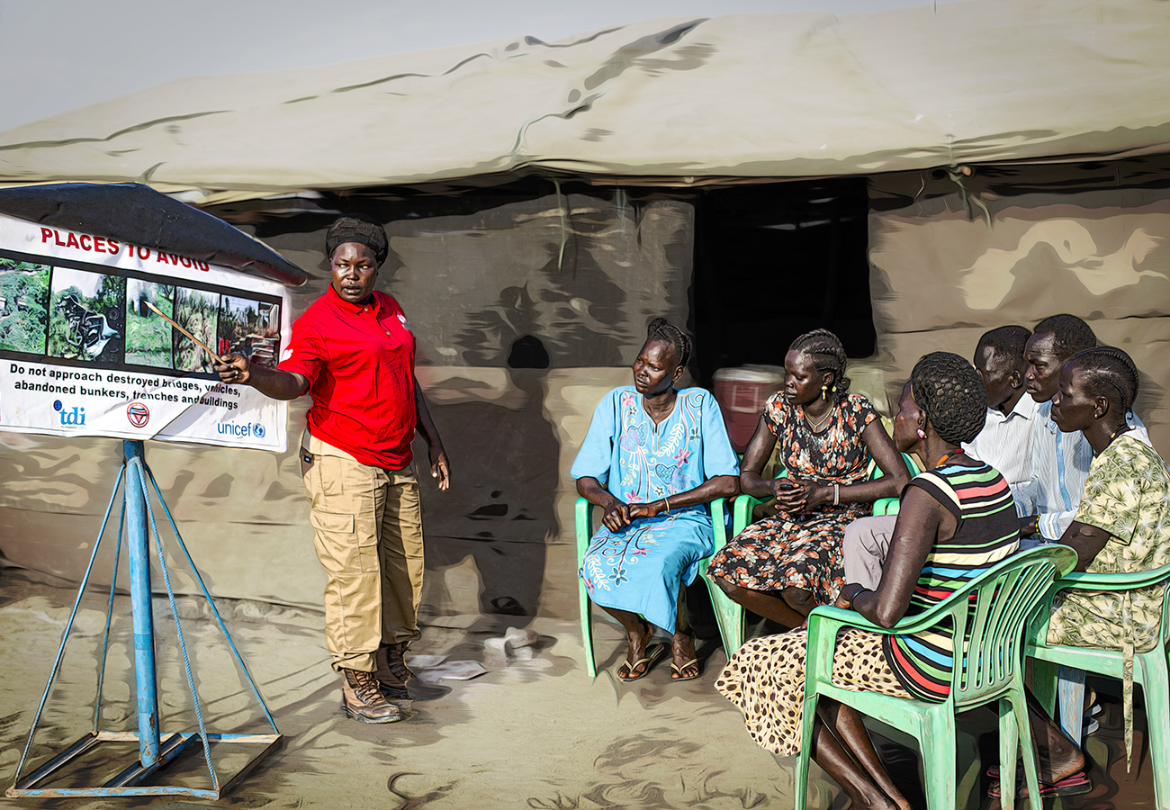 Winnie, a community liaison officer, delivers mine risk education in Equatoria, South Sudan.