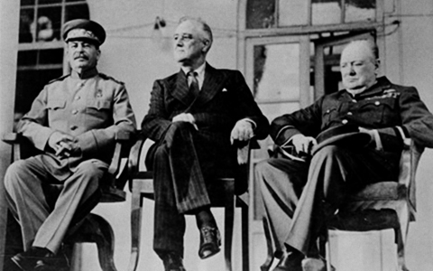 Premier Joseph Stalin at left, President Roosevelt at center and Prime Minister Churchill at right meeting in Teheran in 1943.