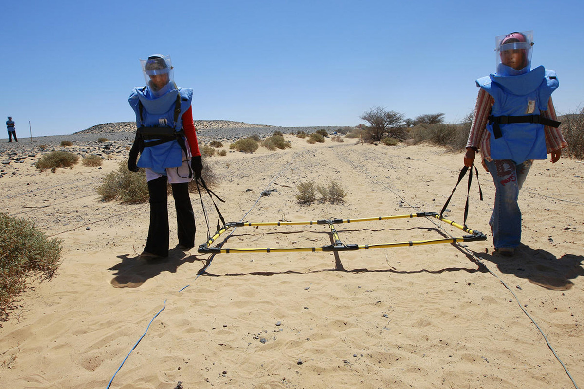 women deminers at work