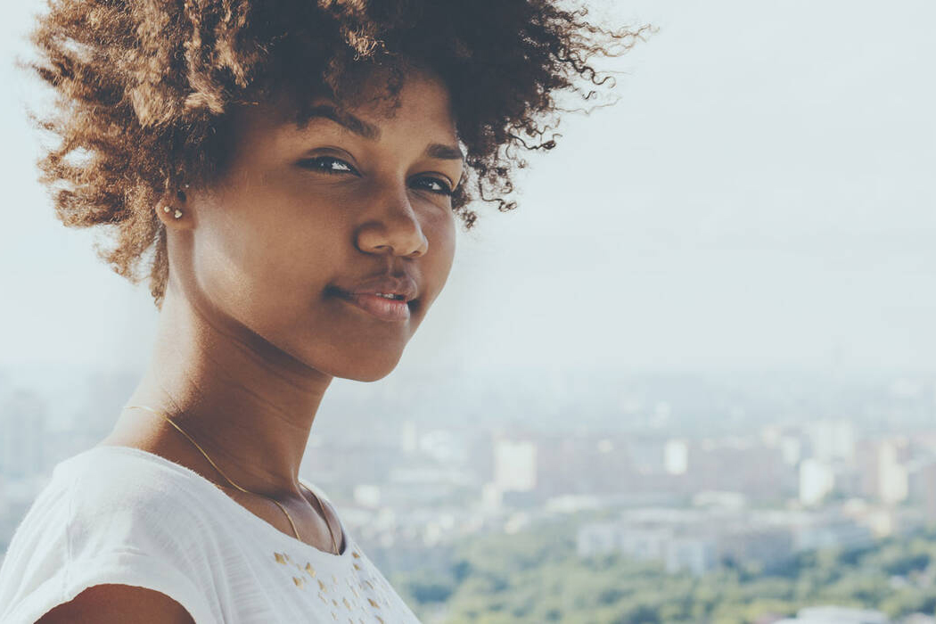 girl with city in the background