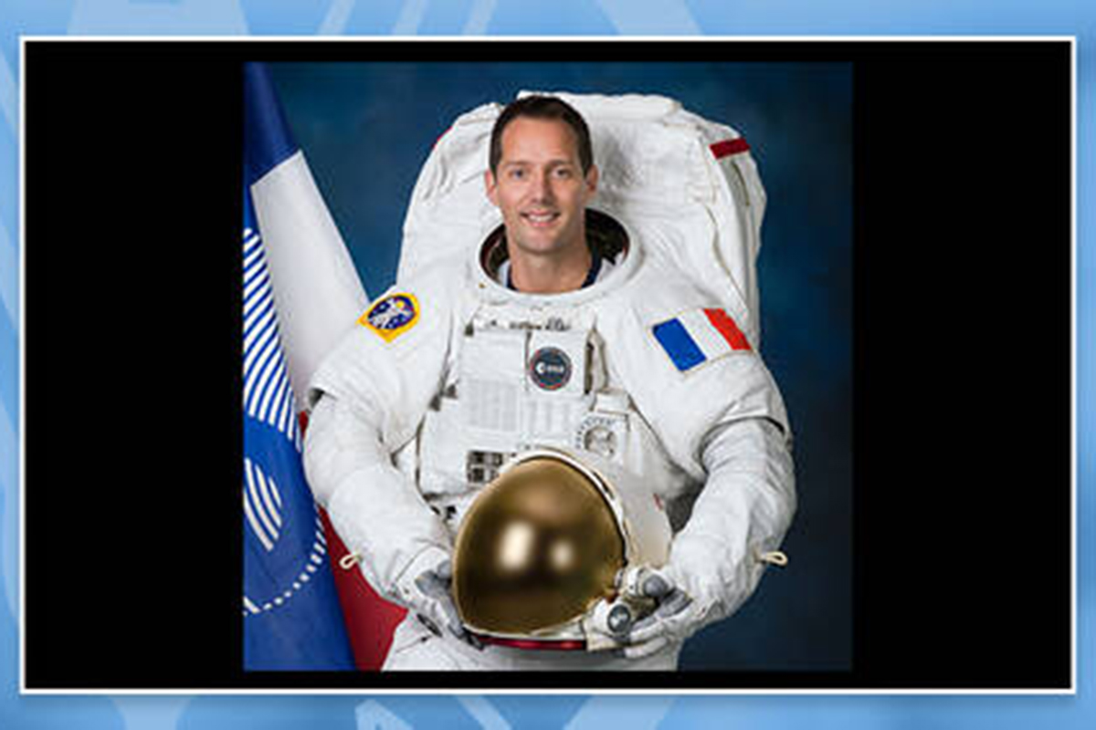 Thomas Pesquet wearing a space suit.