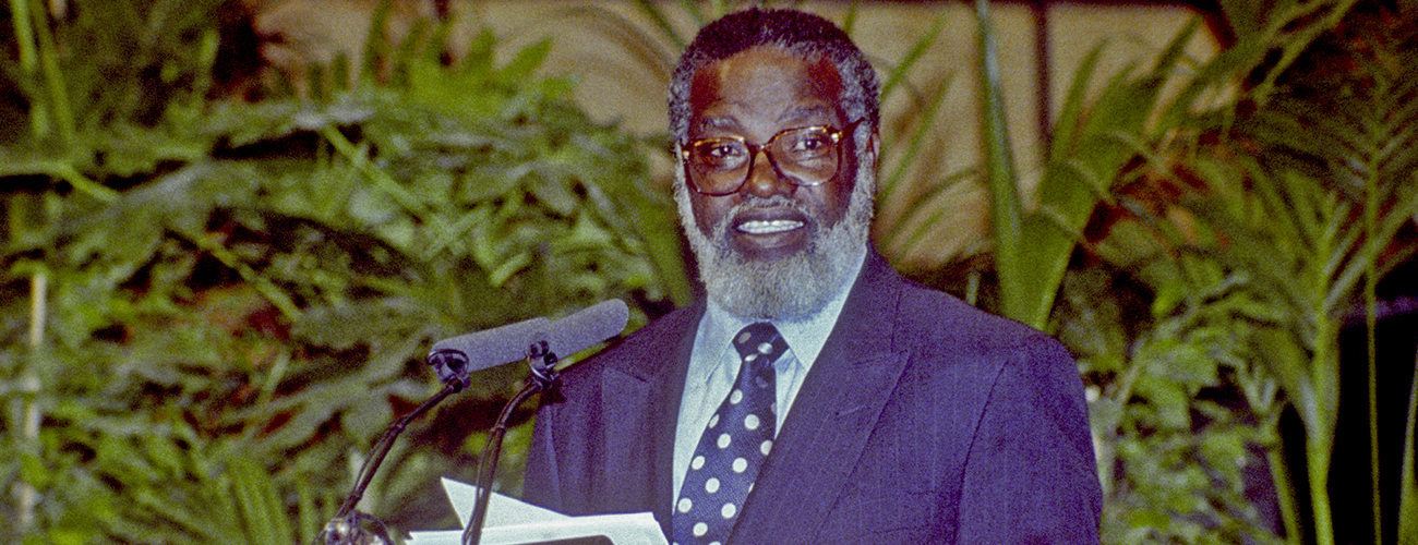Sam Nujoma, President of Namibia, looking at the audience as he speaks from the podium.