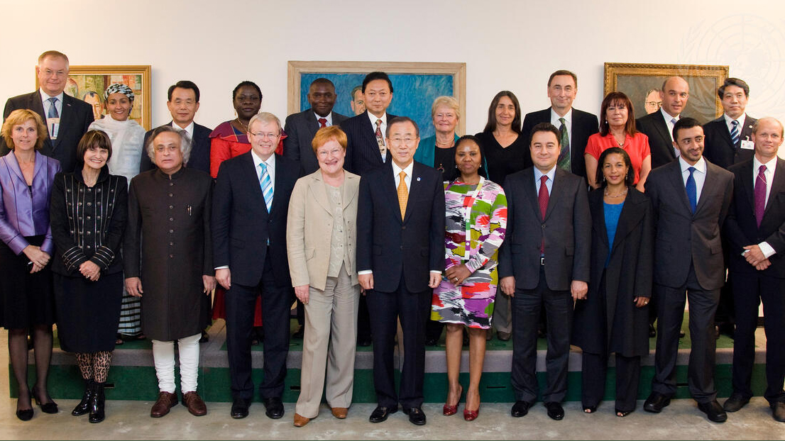 Former Secretary-General Ban Ki-moon poses for a group photo with members of the High-level Panel on Global Sustainability