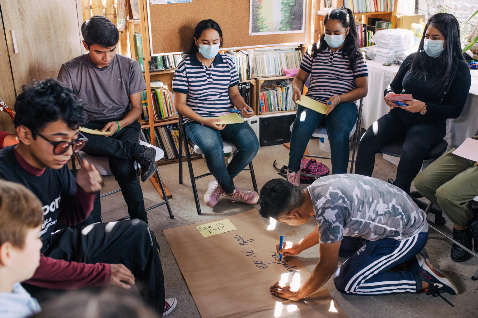 Students drawing on blackboard. UNICEF photos