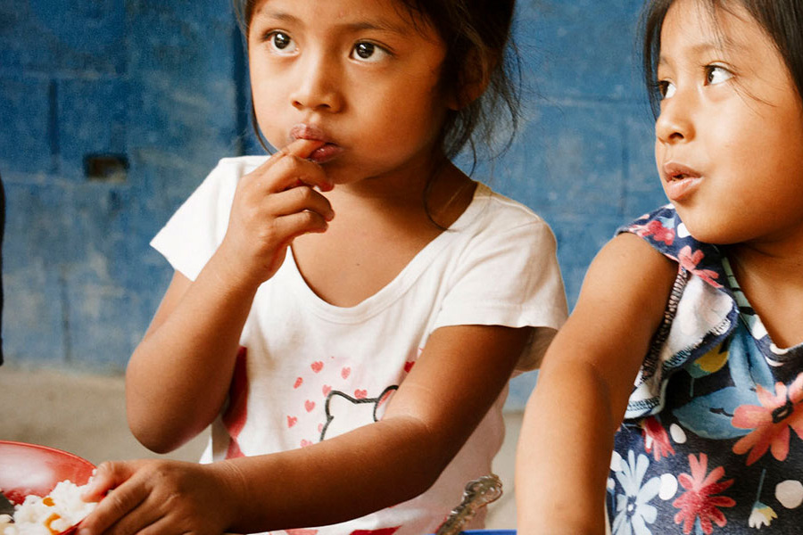 two girls eating