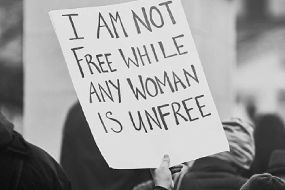 A sign reading ‘I am not free while any woman is unfree’ © Gettyimages