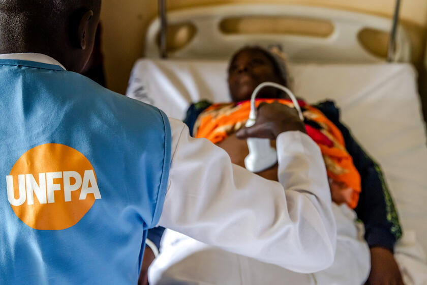 UNFPA medical staff examining pregnant woman