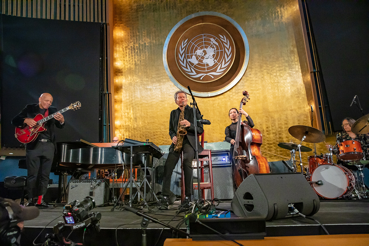 Musicians playing on a stage at the General Assembly Hall at UNHQ, New York