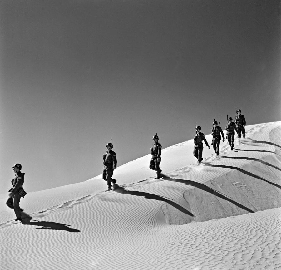 Peacekeepers walking in the desert