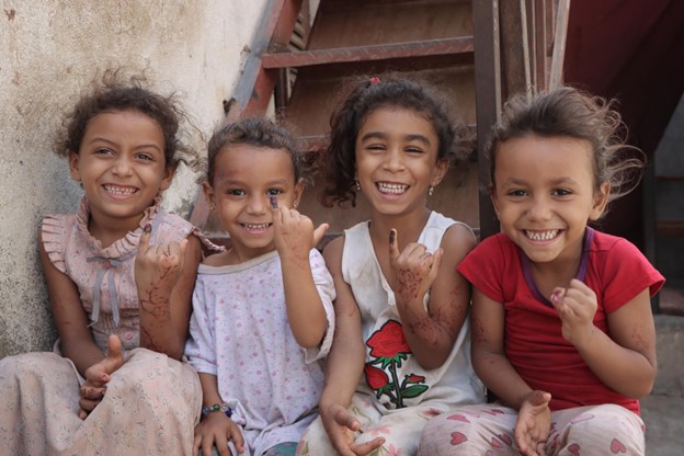 Four children smilling