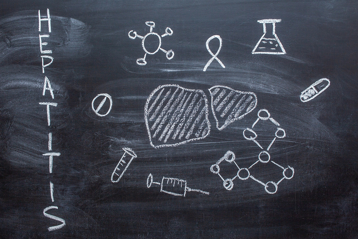 hepatitis fighting disease concept on a chalkboard