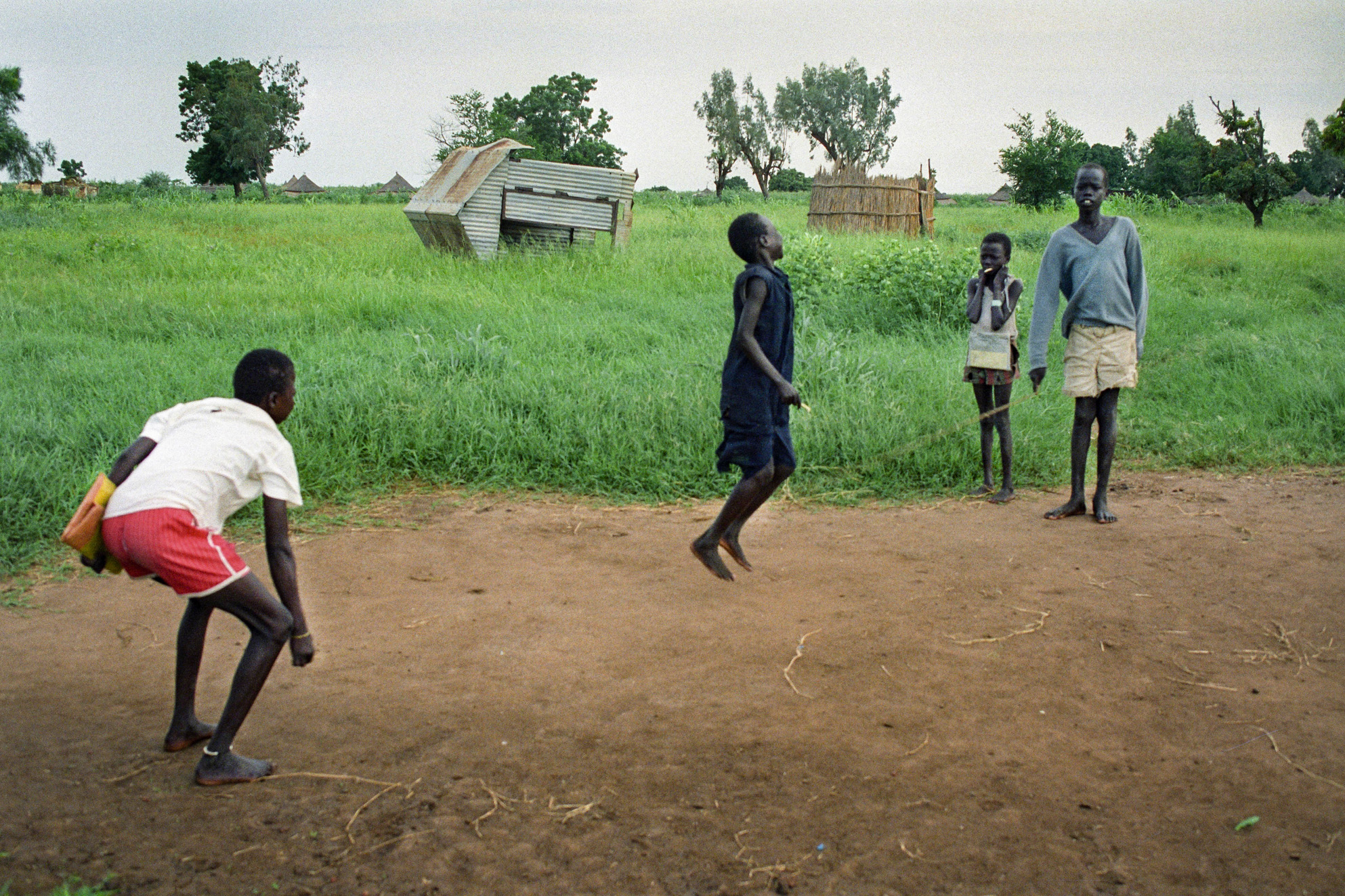 a group of children playing outdoors