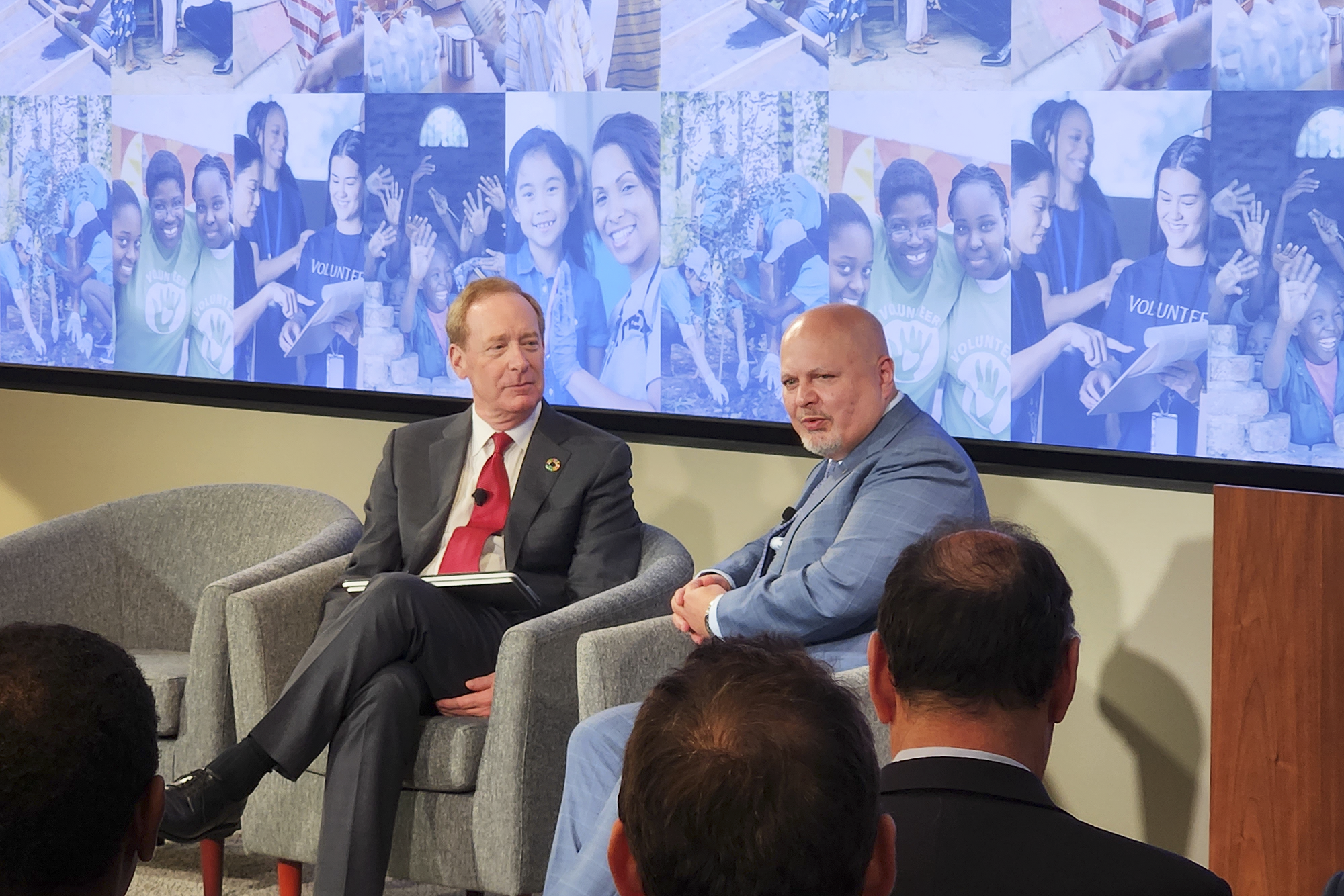 International Criminal Court's prosecutor Karim Khan (right) in discussion with Brad Smith (left), Vice Chair and President of Microsoft