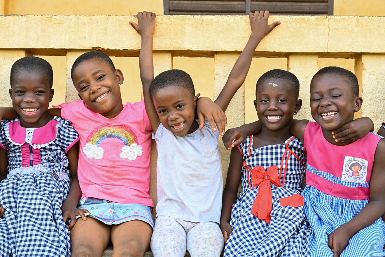 five children smiling.