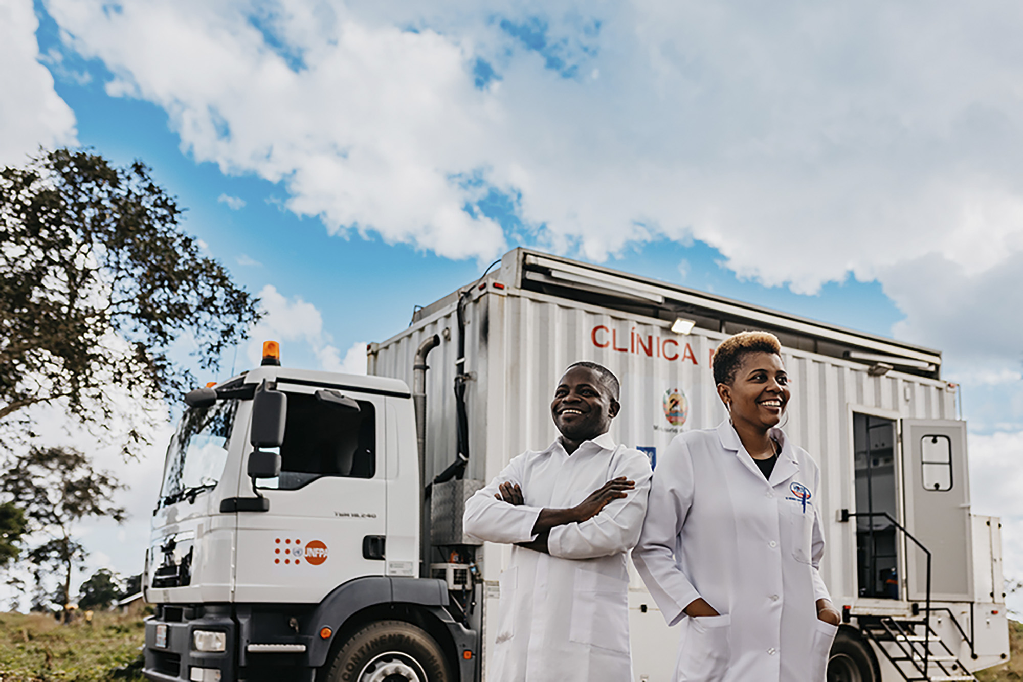 Two doctors in front of a mobile clinic in Cabo Delagado, a province of Mozambique.