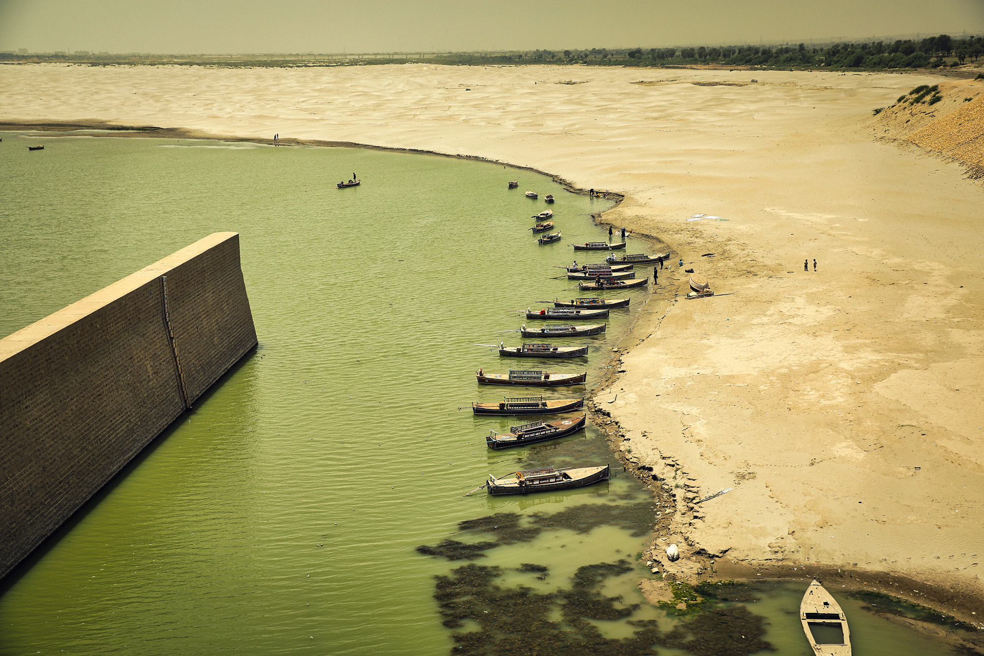 Boats tied to the bank of the Indus River in Pakistan.
