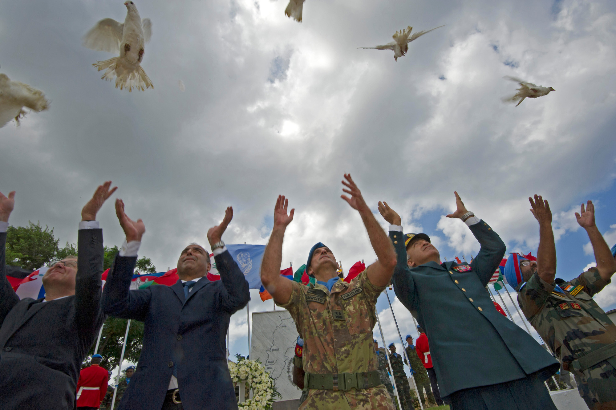 doves being released by peacekeepers