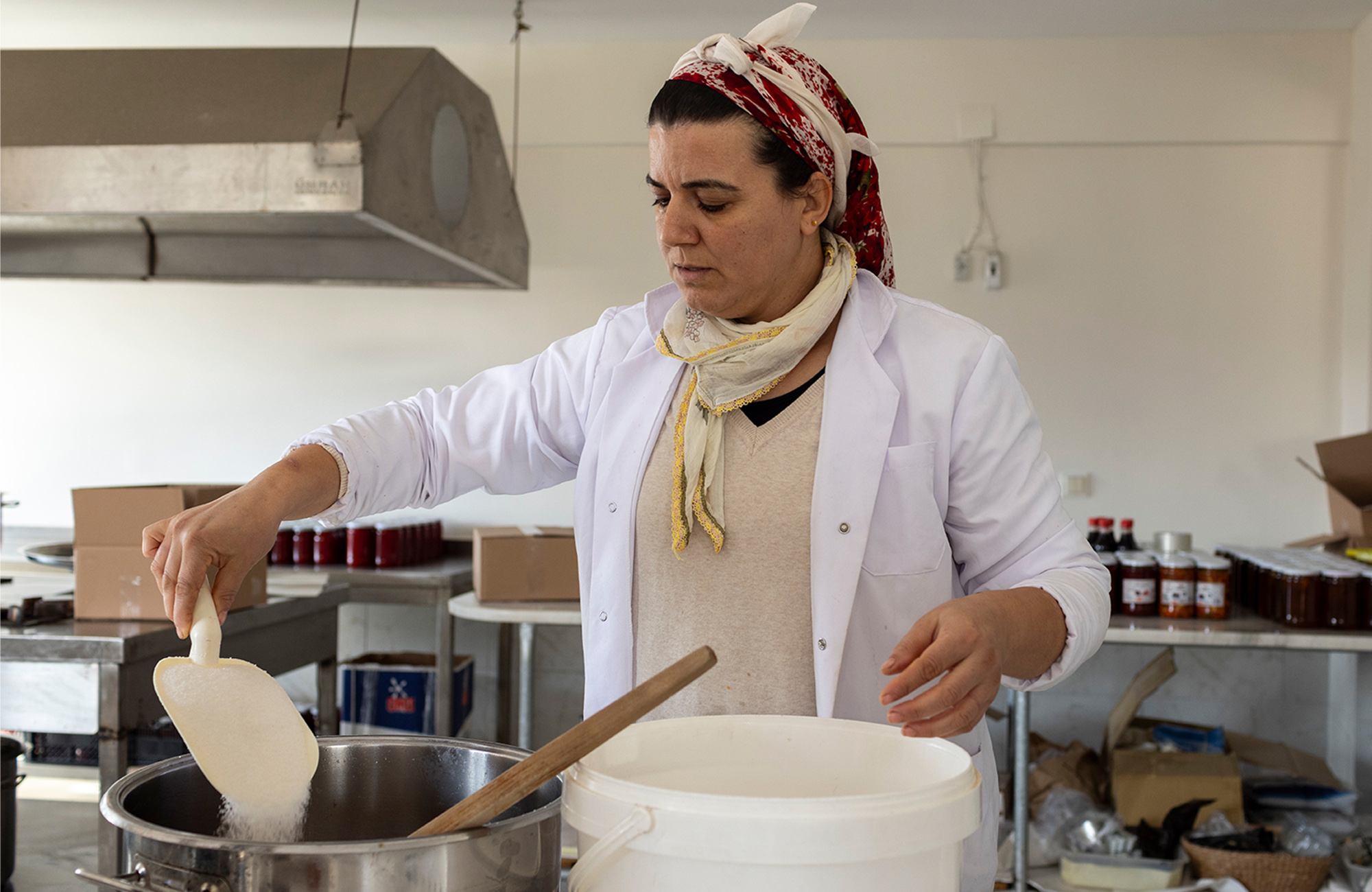 A member of a women’s Turkish cooperative producing jam.