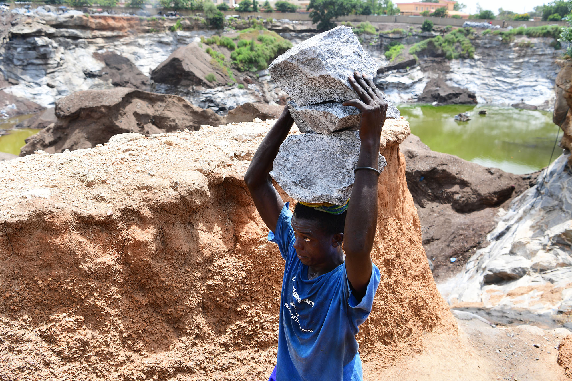 A child works at the granite mine in Pissy, a suburban of Ouagadougou, the capital of Burkina Faso.