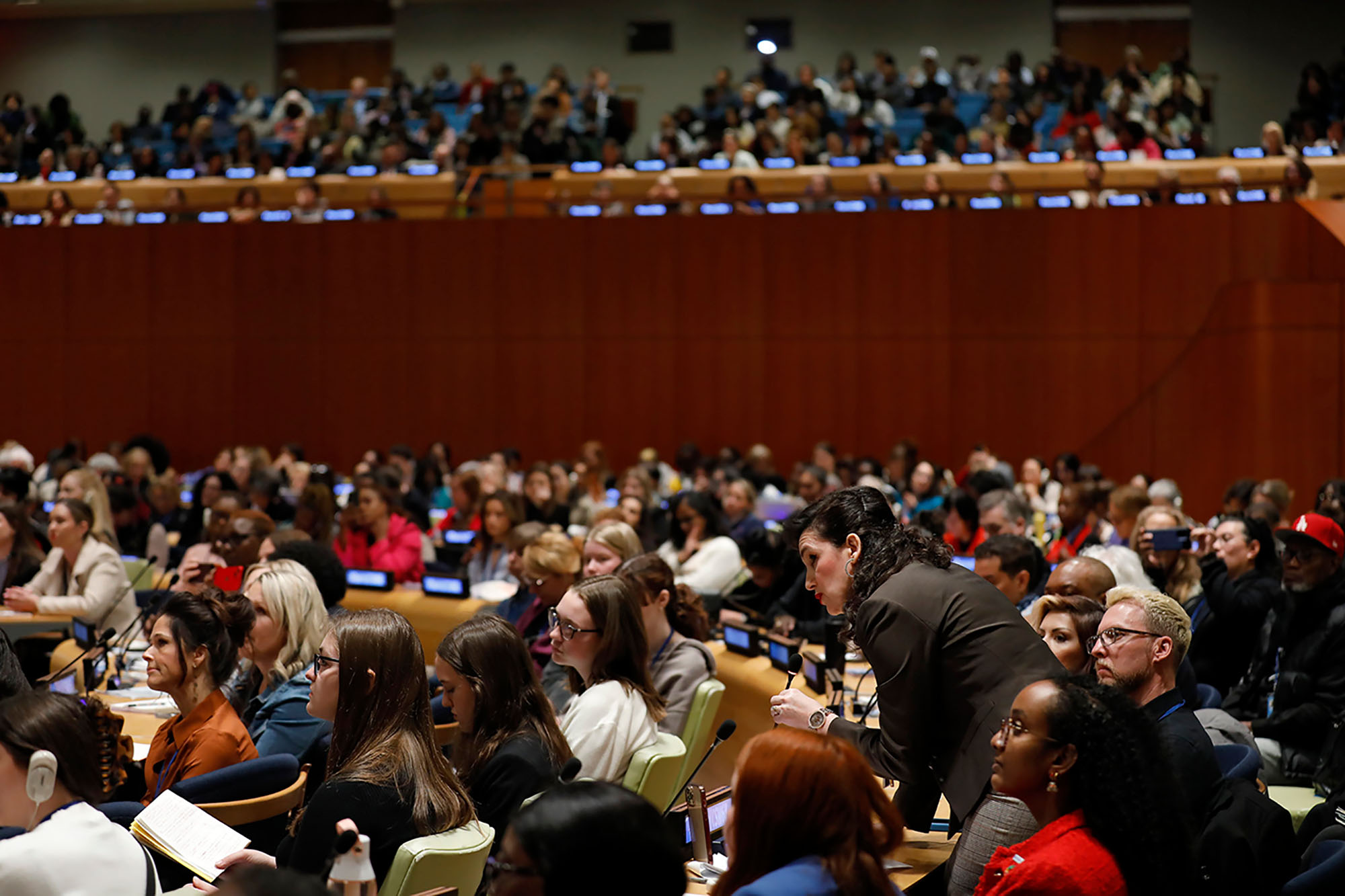 A woman takes the floor during a meeting of the Commission on the Status of Women.