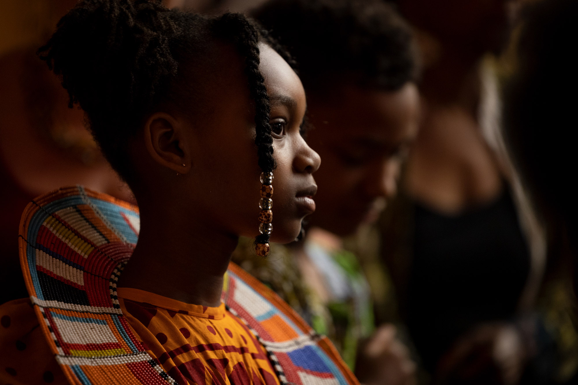 girl in African traditional dress seen in profile