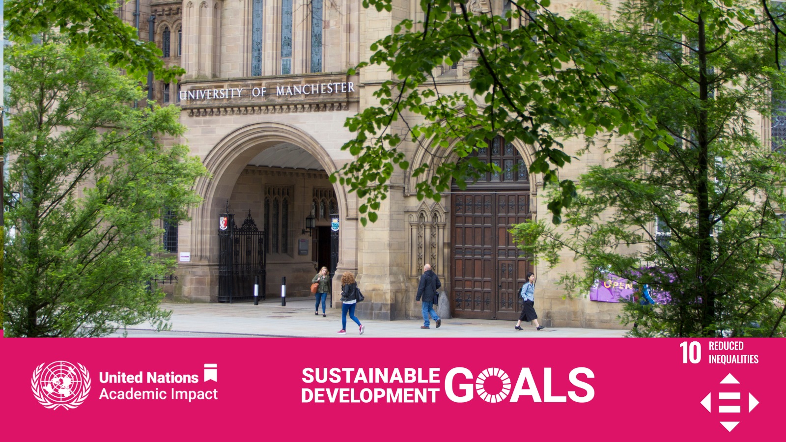Campus of the University of Manchester with a banner of SDG 10 under it.