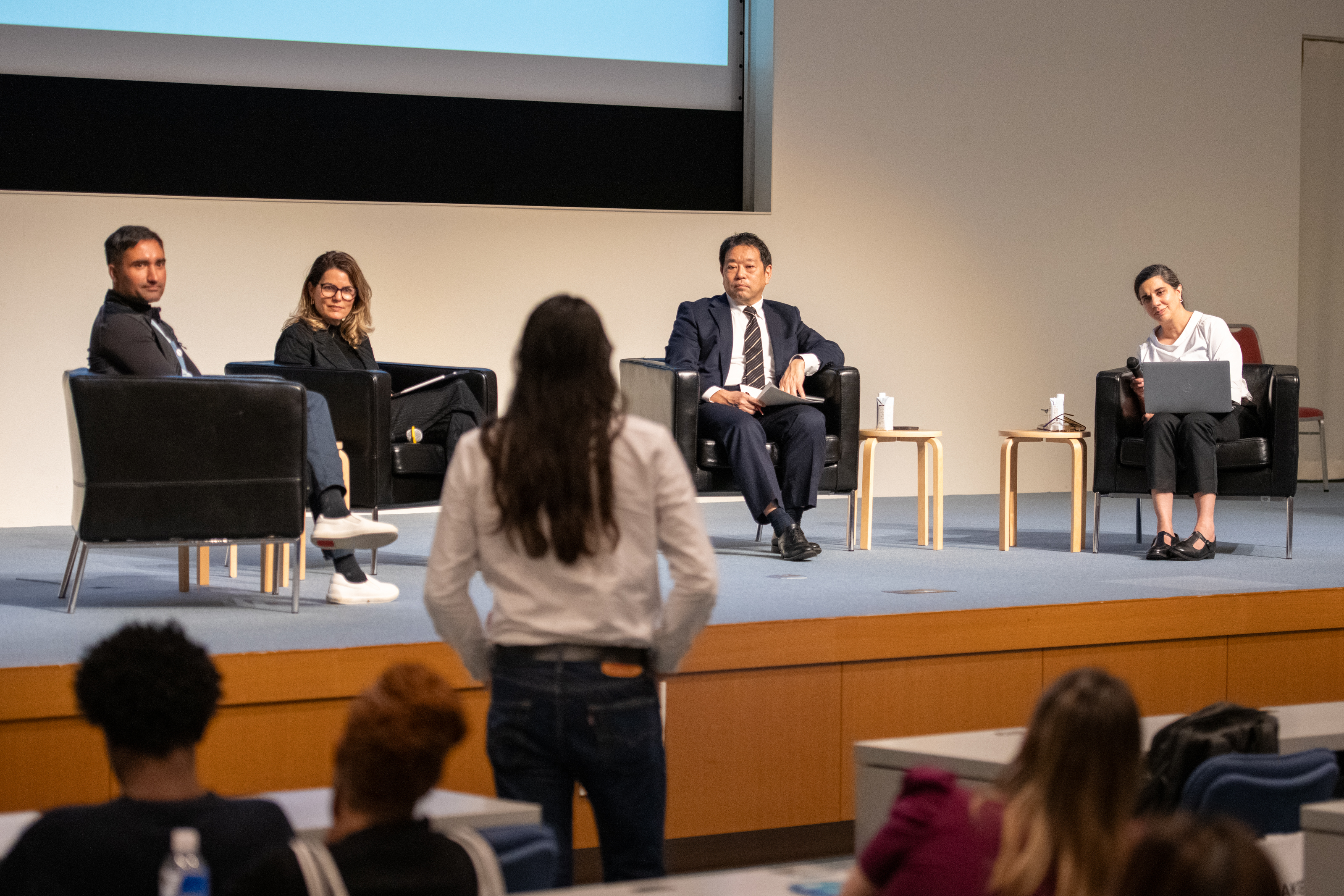 Panelists Bishesh Khanal, Nayat Sánchez-Pi, Sadao Kurohashi, and Roheena Anand (left to right) take questions from the audience during Q&A.