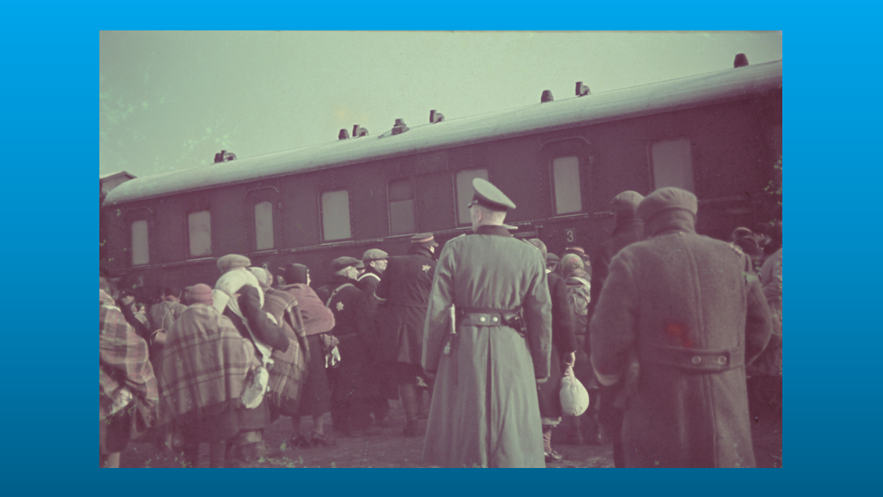 Trains were key to facilitating the implementation of the Nazi plan for annihilation. Lodz ghetto deportation, Poland, April 1942. Photograph by Walter Genewein, the Nazi chief accountant in the Lodz ghetto who was also an amateur photographer.