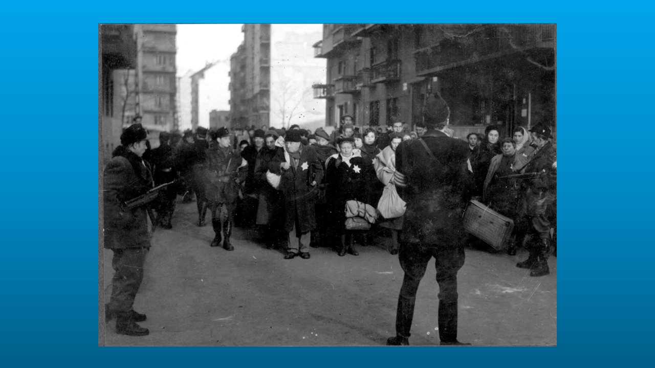 Deportation of Jews in Budapest, Hungary, by the Hungarian Arrow Cross Party, circa 1944. Photographer unknown.