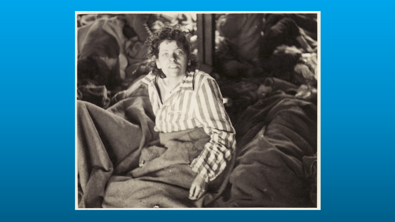 A survivor in Bergen Belsen concentration camp, Germany, after liberation, April 1945.