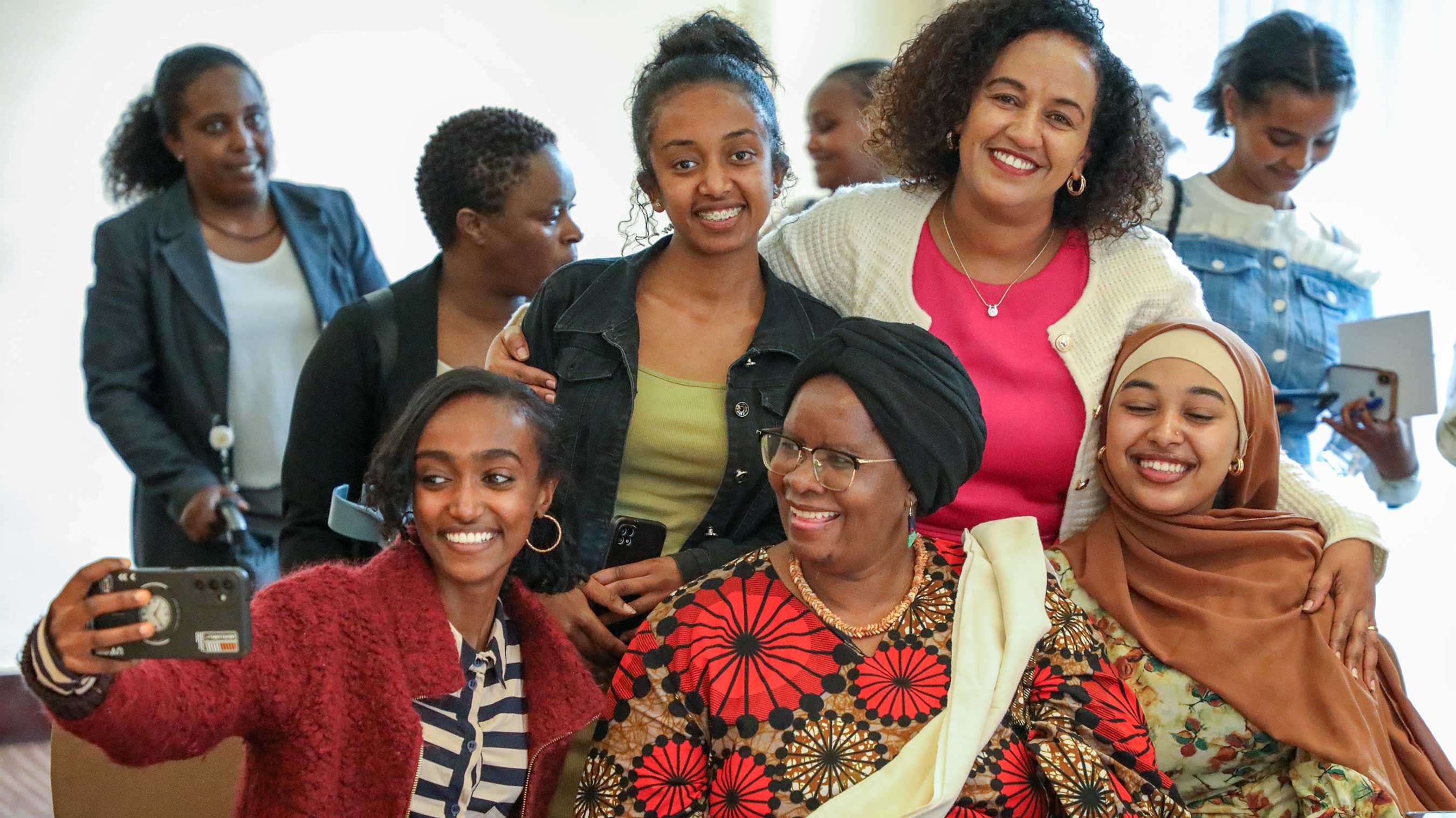 Selfie group photo with women and girls