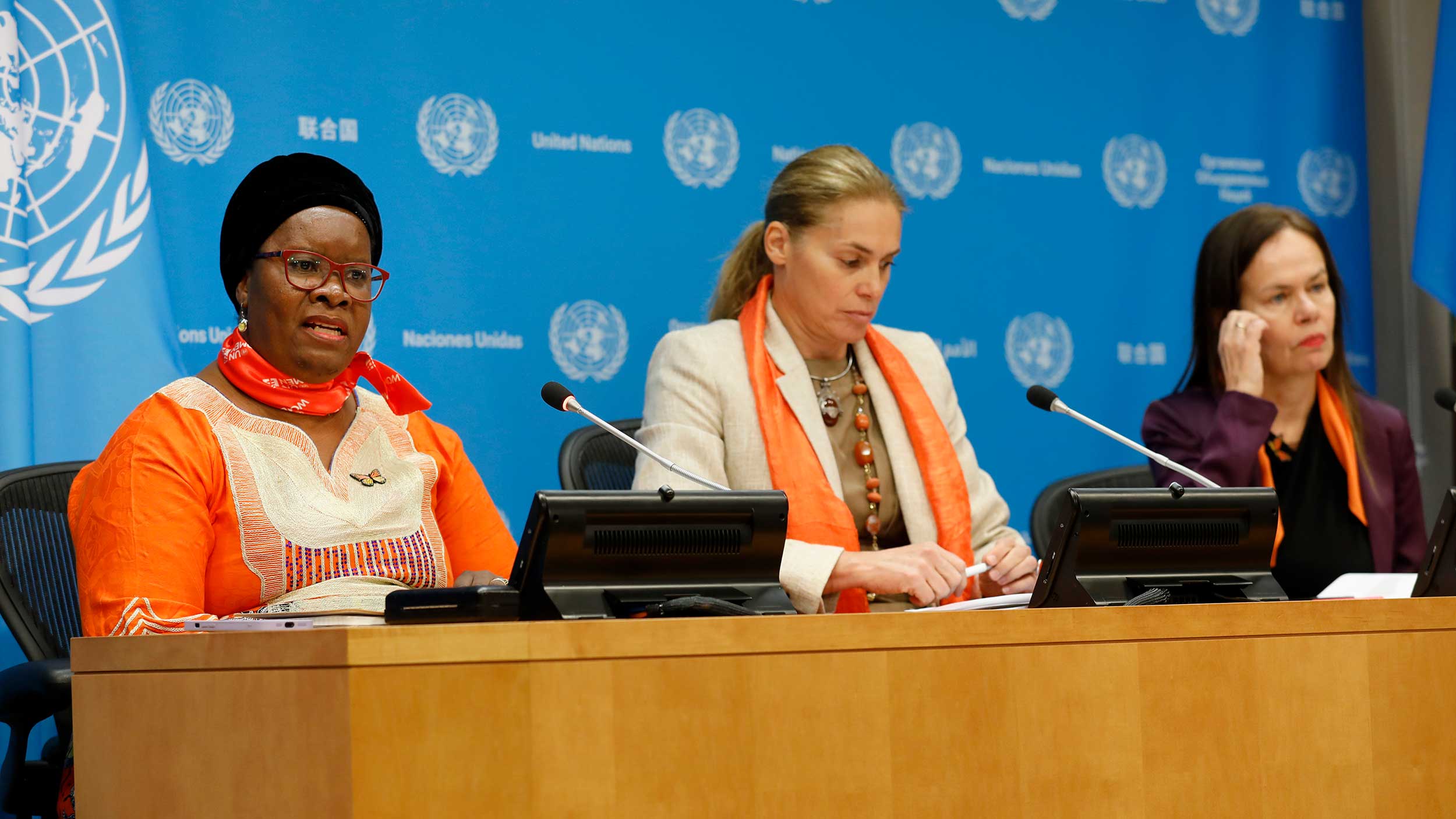 Nyaradzayi is at a Press Conference with 2 women sitting next to her