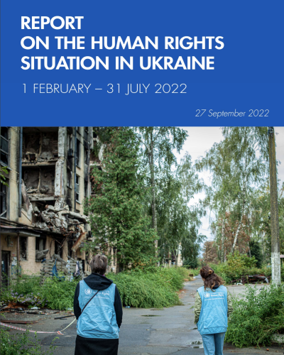 Cover of the report showing UN staff looking at buildings in ruin