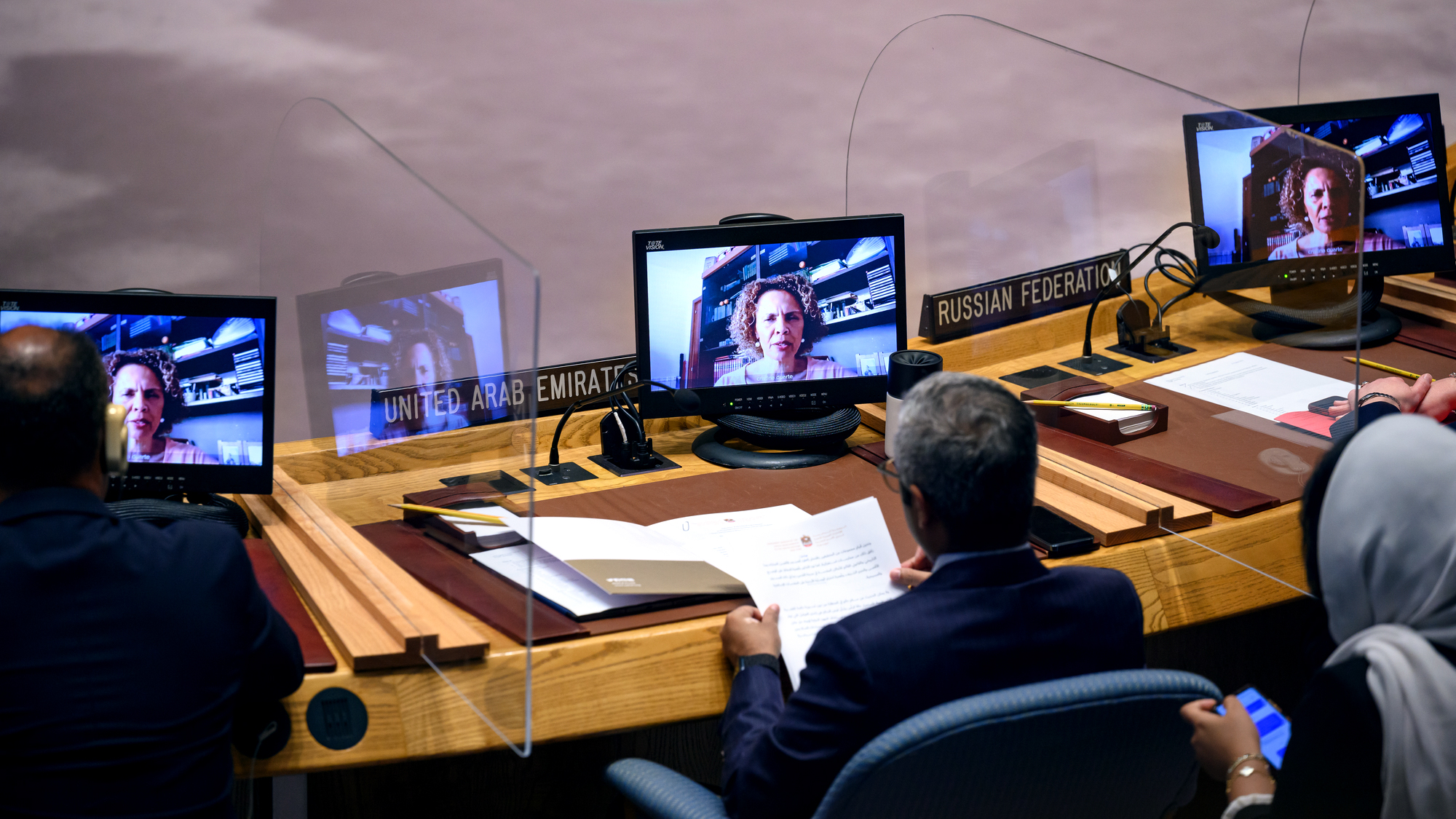 screen at the UNHQ Security Council show Cristina on screens