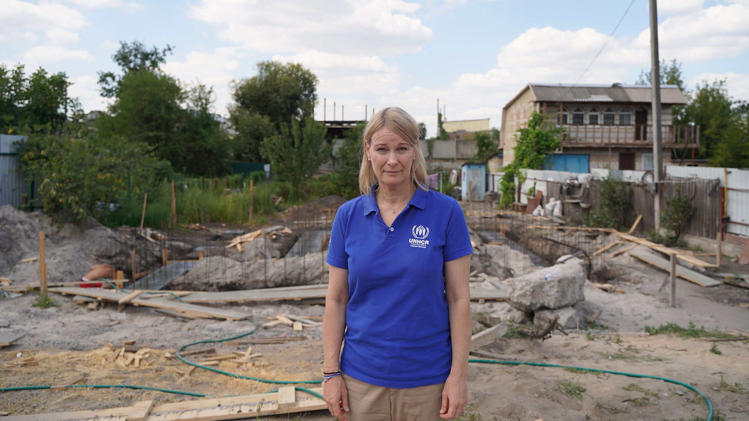 Karolina is pictured standing next to a construction area