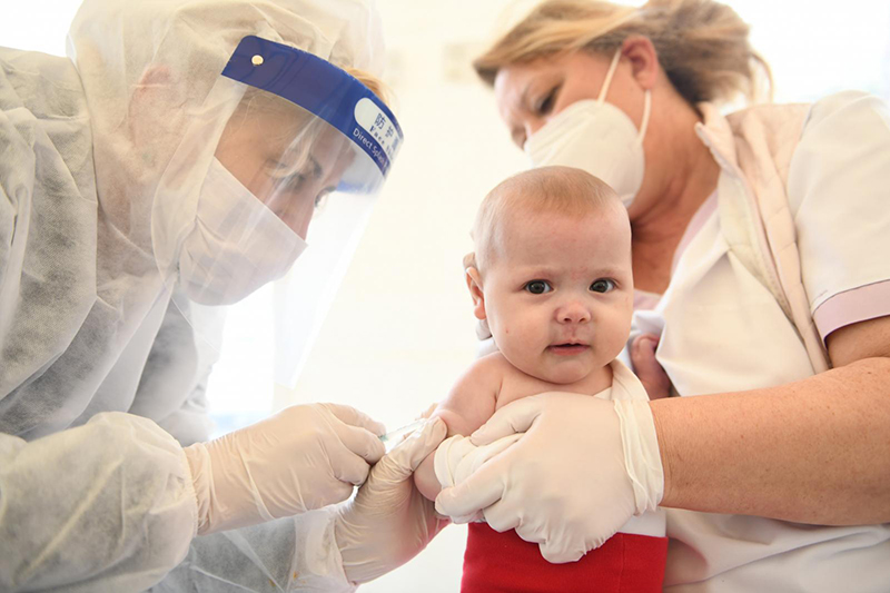 baby being vaccinated