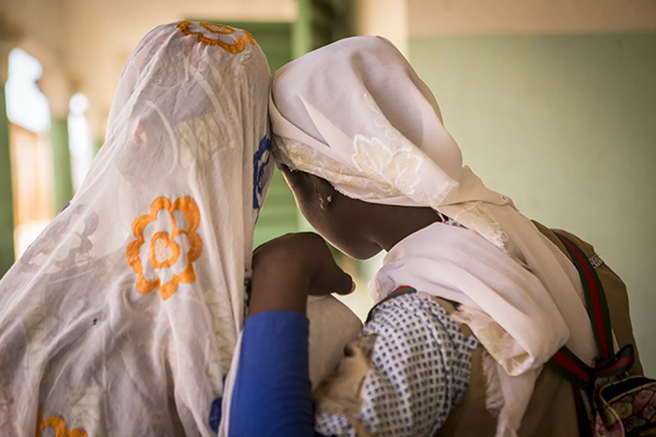 A 15-years-old girl who escaped early marriage and who was also a victim of excision with his mother, Republic of Mali, December 2019