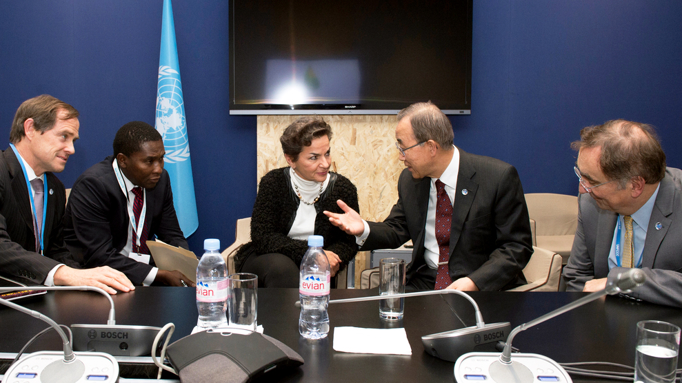 Former Secretary-General Ban Ki-moon confers with his climate advisors including Selwin Hart 