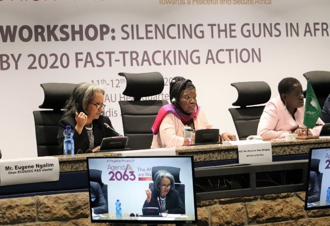 2 panelists at the head table in a workshop