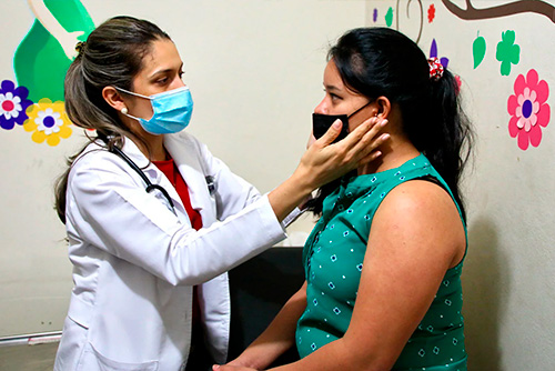 A doctor checking a patient