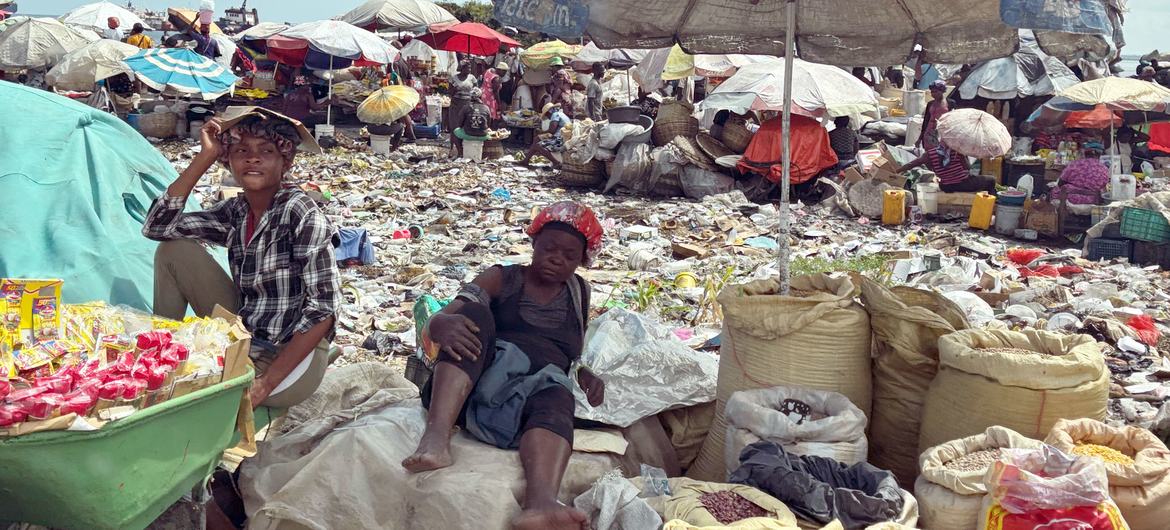 Vendors surrounded by garbage sell goods in Port-au-Prince, Haiti.
   

11 March 2025 Human Rights