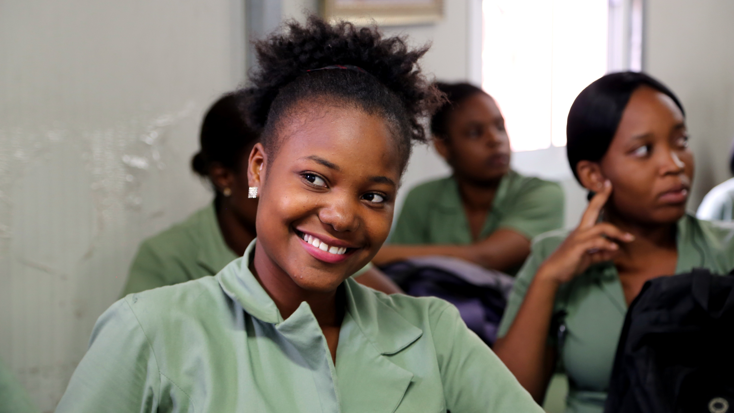 Young women of African descent in class