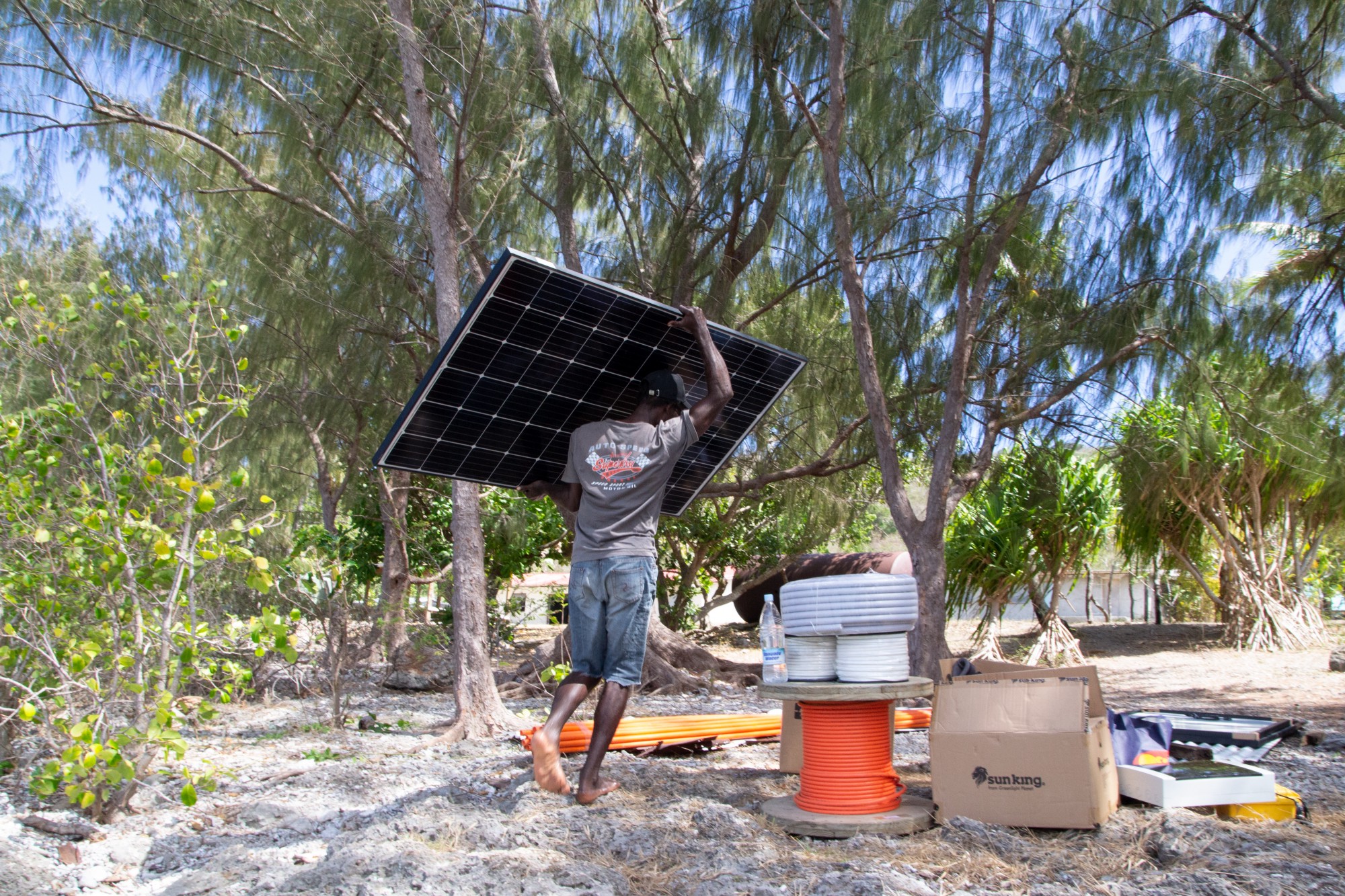 Villagers install solar panels in Lelepa, Vanuatu.