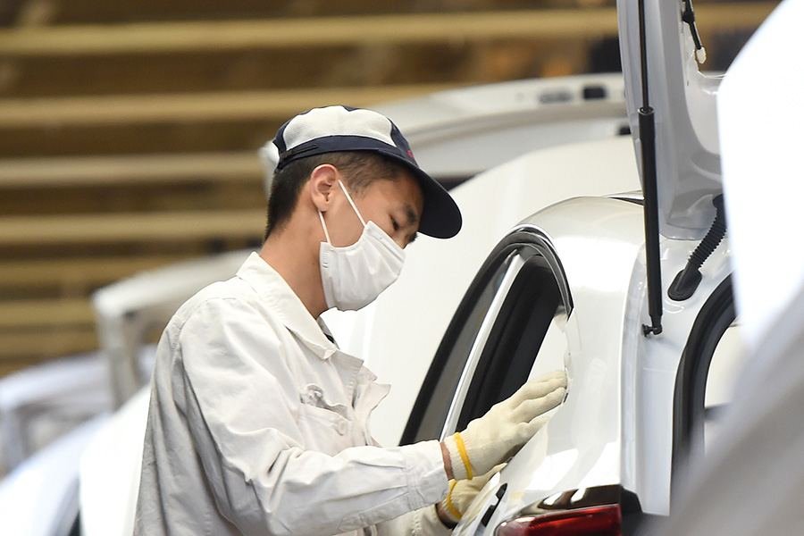 Chinese worker with mask