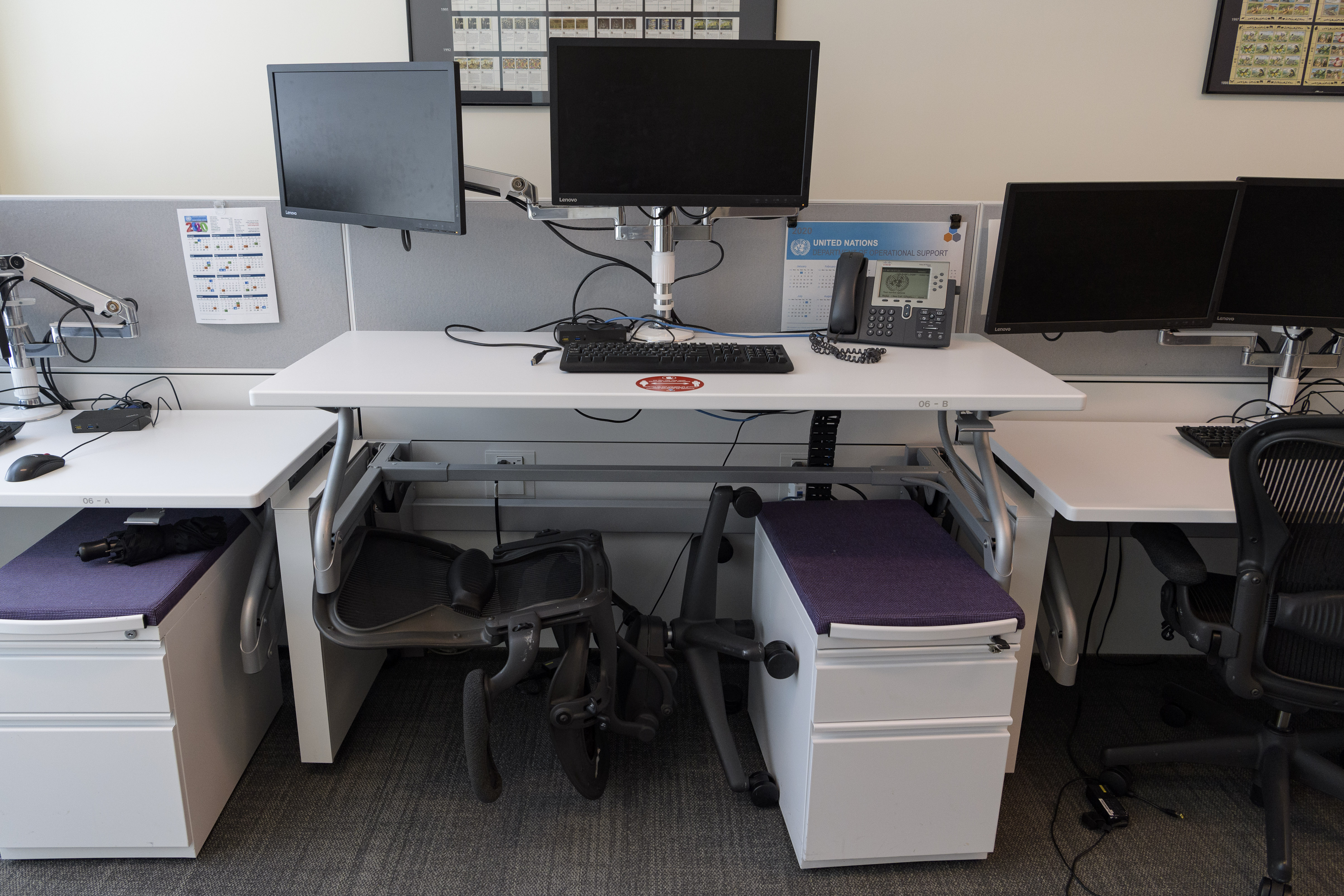 Chair on its side under a desk.