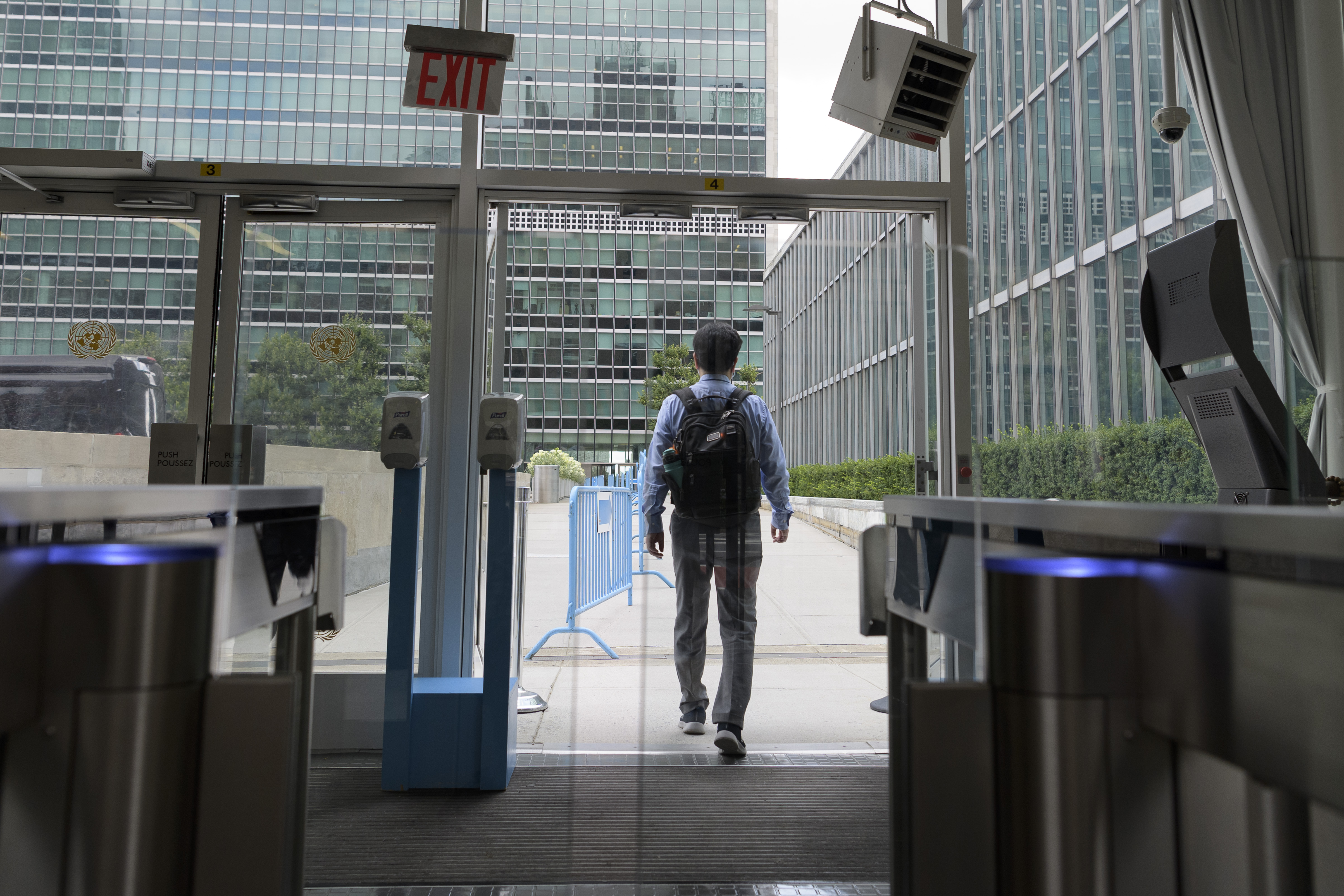 Man crosses a security gate